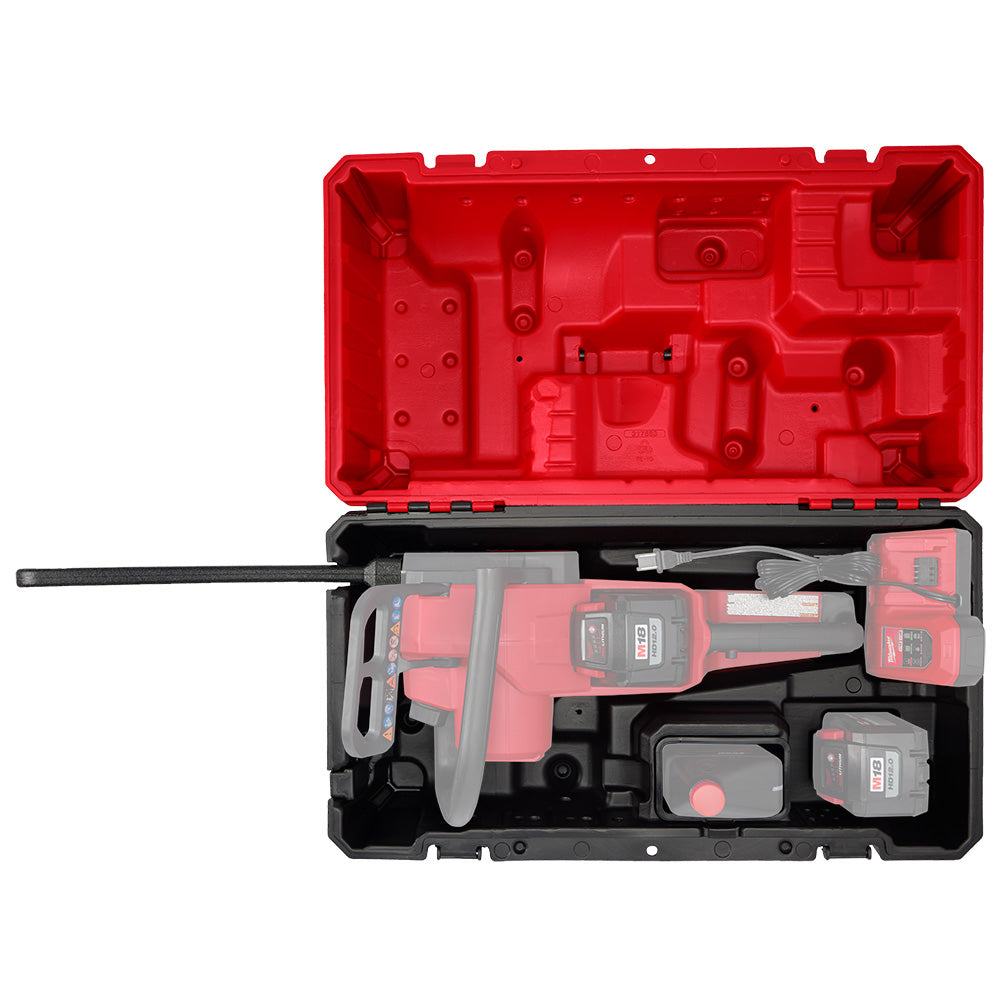 Red and black hard case with molded foam inserts holding chainsaw, batteries, charger, and accessories.