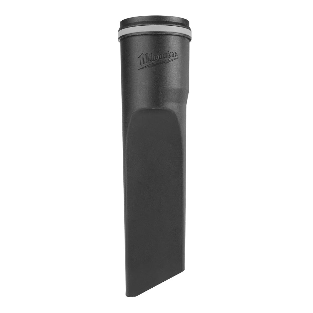 Black cylindrical crevice tool with Milwaukee branding and narrow flat attachment end for reaching tight spaces.