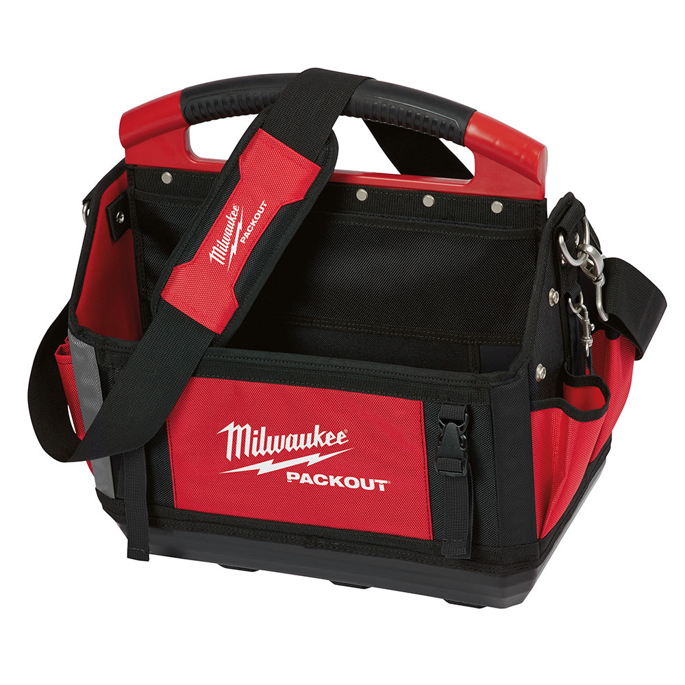 Red and black Milwaukee PACKOUT tote with dual handles, multiple pockets, and shoulder strap.