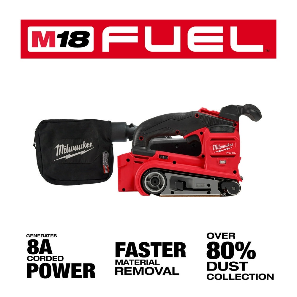 Red and black Milwaukee M18 FUEL belt sander with dust collection bag attached to the side.