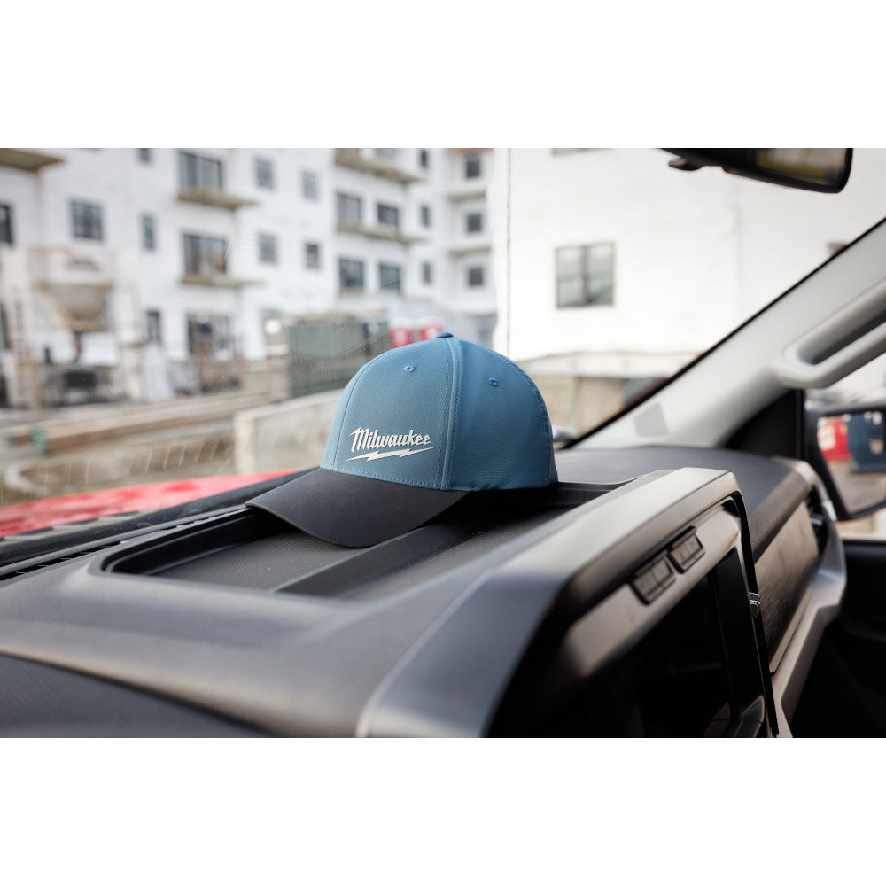 Blue and black fitted baseball cap with Milwaukee branding on the front crown.
