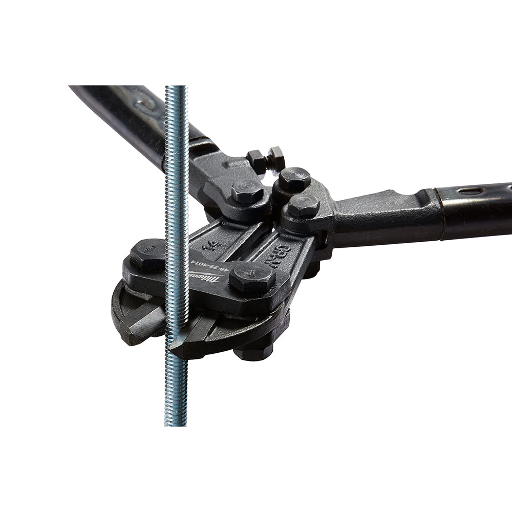 Black bolt cutter with metal handles positioned to cut a threaded steel bolt.