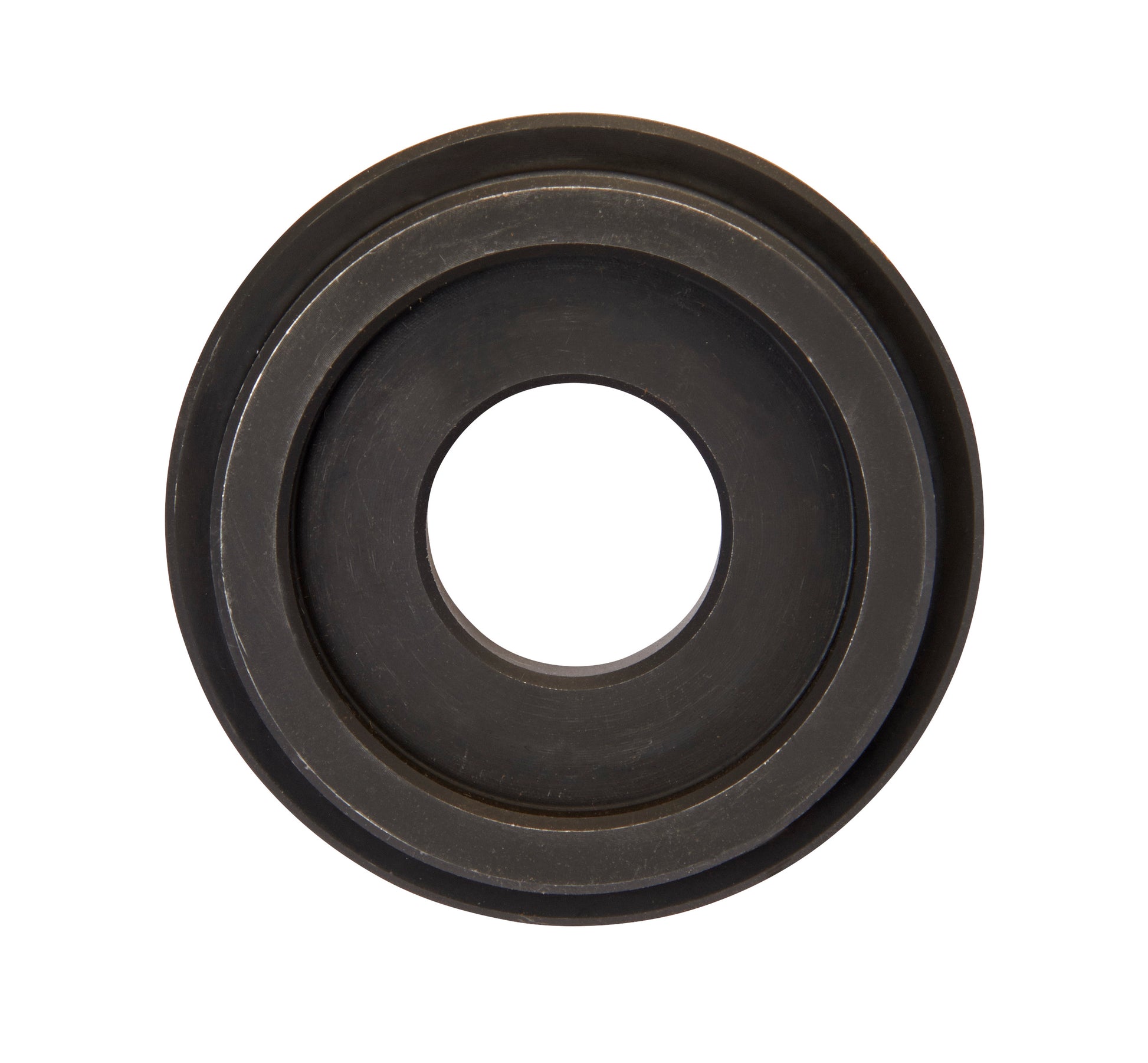 Dark metal circular die spacer with concentric rings and center hole.