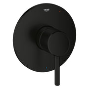 Matte black circular valve trim with single lever handle and Grohe branding on round escutcheon plate.