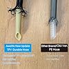 Pull-out hose assembly with chrome and white components on wooden surface.