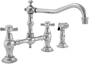 Stainless steel bridge kitchen faucet with curved spout, dual cross handles, and detached side spray.