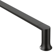 Black wall-mounted towel bar with rounded cylindrical support bracket on white background.