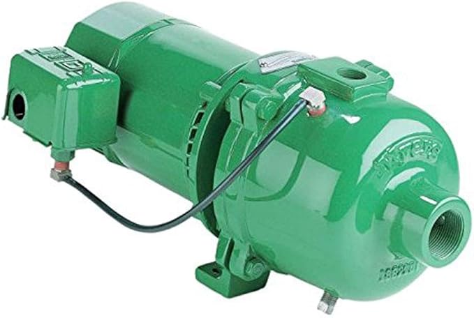Green shallow well jet pump with motor assembly, discharge outlet, and mounted control box on side.
