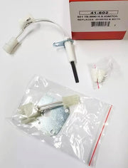 Robertshaw 41-602 hot surface ignitor with white ceramic element, metal mounting bracket, connectors, and packaging.