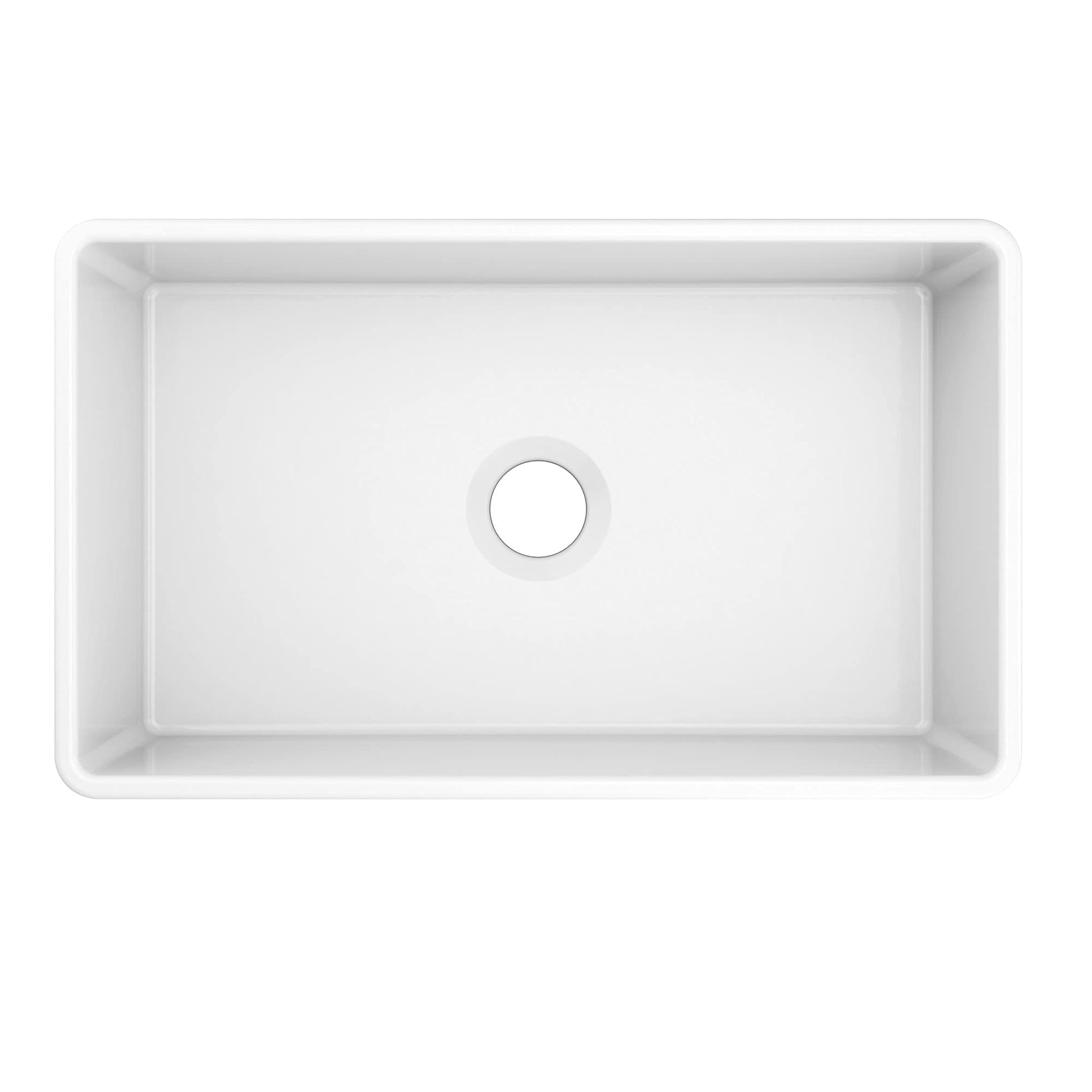 White fireclay single bowl undermount kitchen sink with apron front and drain hole, viewed from above.