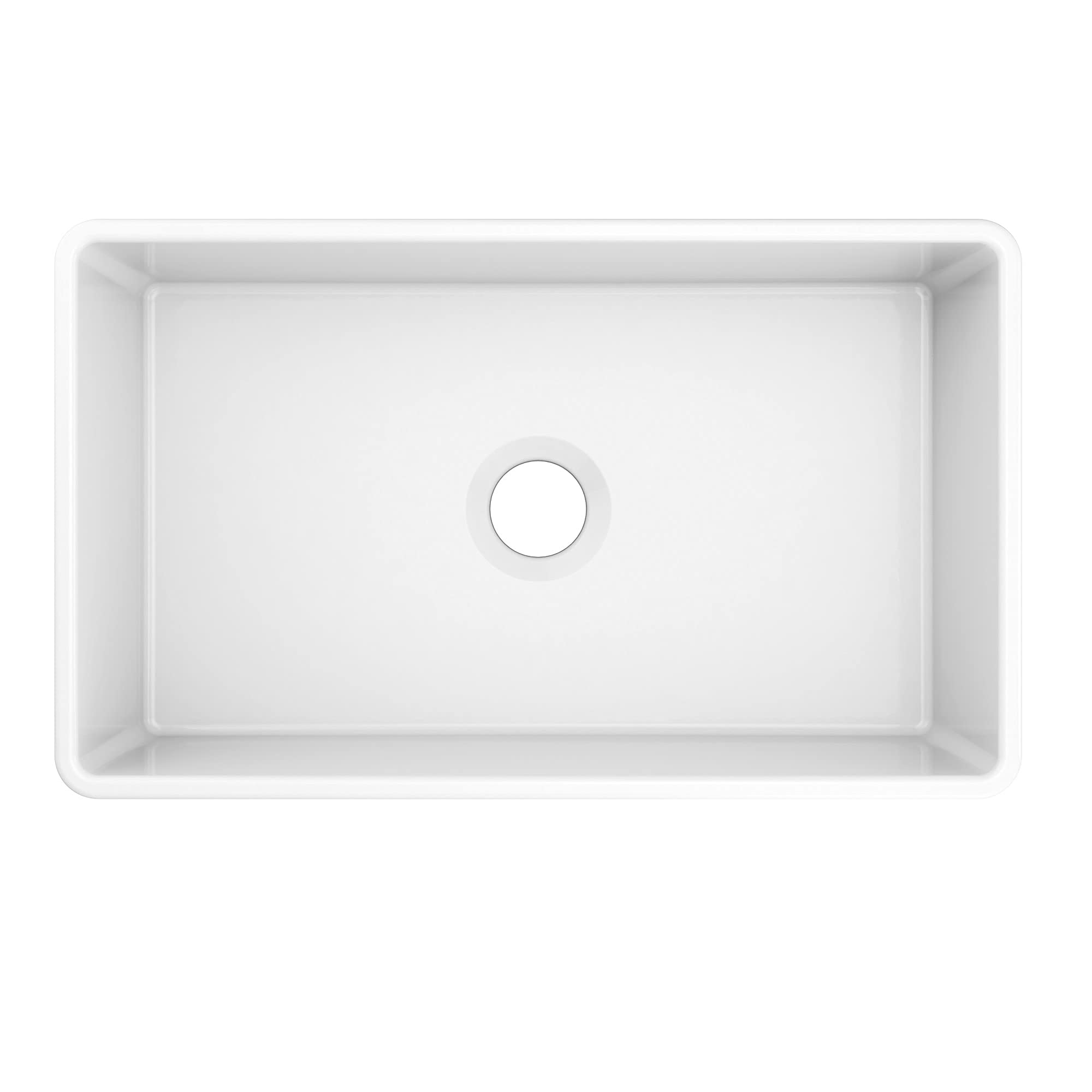 White fireclay single bowl undermount kitchen sink with apron front and drain hole, viewed from above.