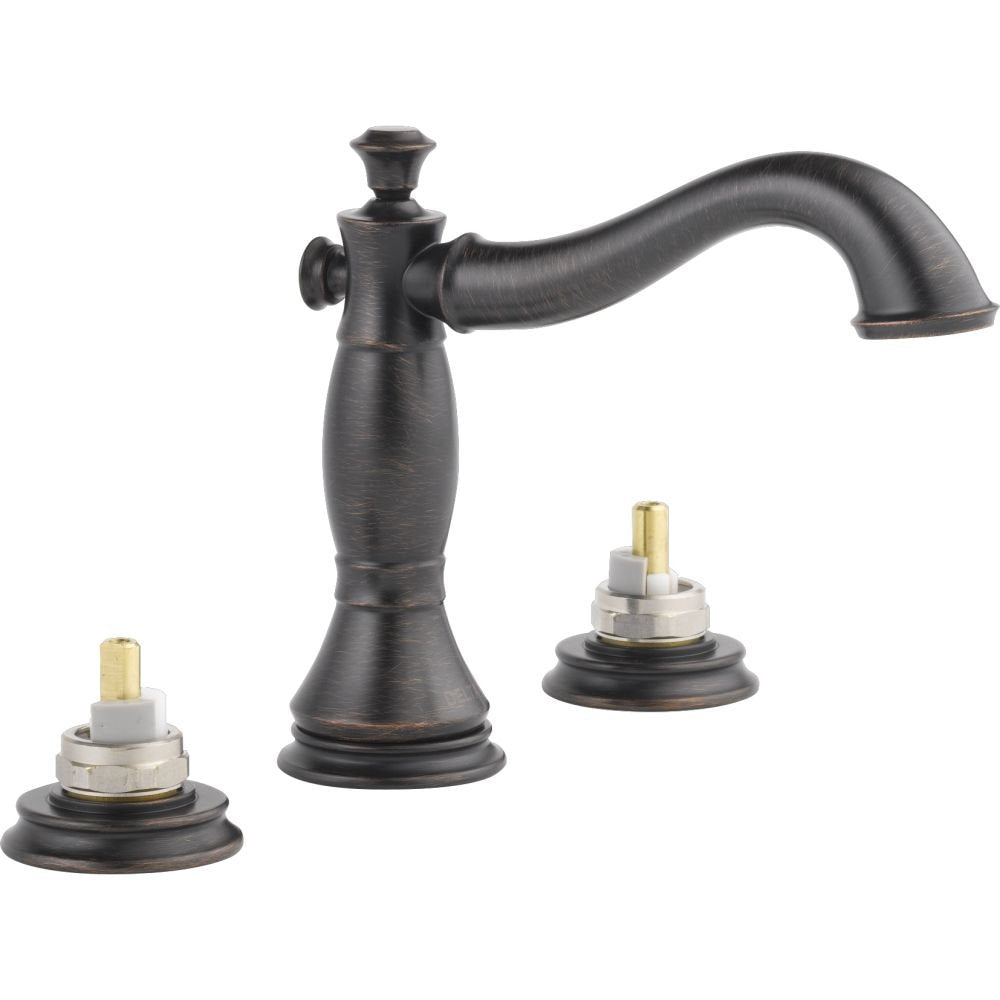 Oil-rubbed bronze two-handle widespread bathroom faucet with curved spout and brass valve stems.