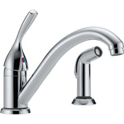 Chrome single-handle kitchen faucet with curved spout and separate spray wand on base.