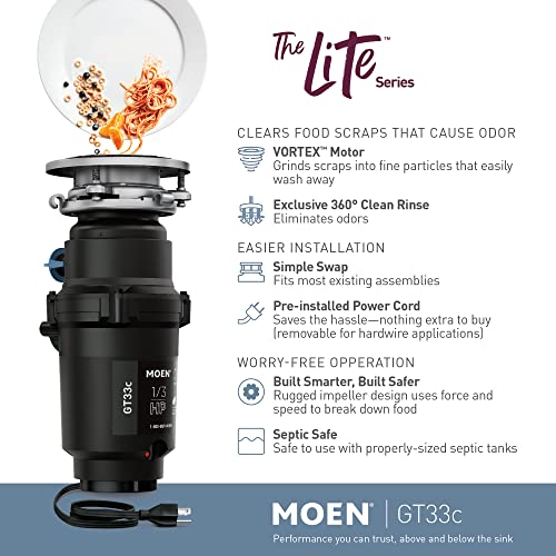 Moen GT33C garbage disposal unit with black cylindrical motor and sink flange, shown with food scraps above and power cord be