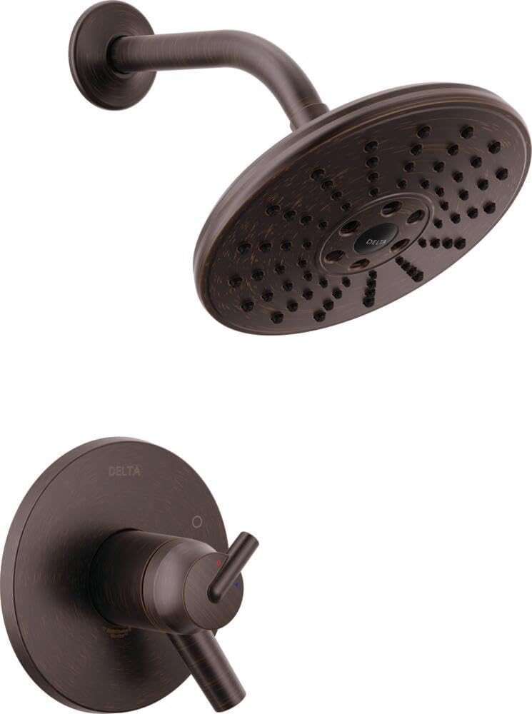 Oil-rubbed bronze shower trim with circular showerhead and control valve on round escutcheon plate.