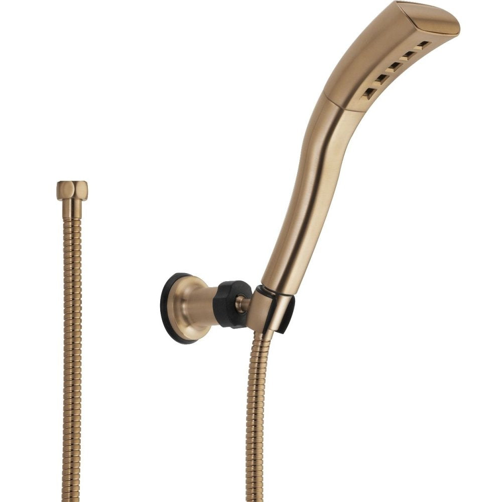 Champagne bronze hand shower with curved head and multiple spray holes, wall mount bracket, and flexible hose connection.