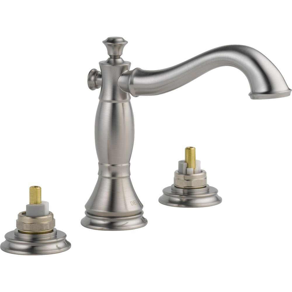 Brushed nickel two-handle widespread bathroom faucet with curved spout and brass valve stems.