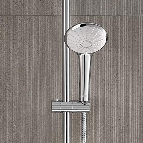 Chrome thermostatic shower system with round rainfall showerhead and vertical slide bar mounted on gray tiled wall.