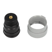 Black knurled regulating nut with brass insert and gray stop ring with ribbed surface.