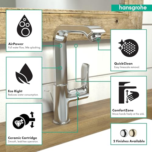 Chrome single-hole kitchen faucet with tall spout and pull-down spray head on wooden counter.