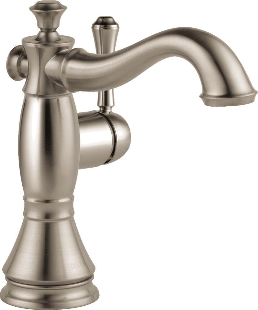 Brushed nickel single-handle bathroom faucet with curved spout and decorative base.