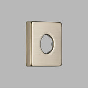 Brushed nickel rectangular shower flange with centered oval opening.