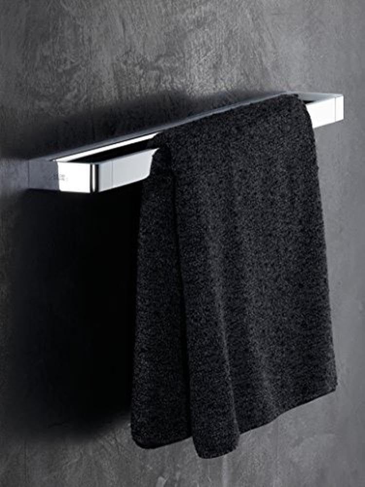 Chrome towel bar with black towel draped over it, mounted on gray textured wall.