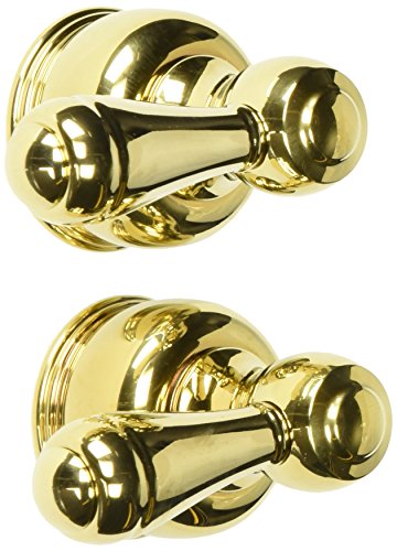 Pair of polished brass metal lever handles with decorative rosettes for bathroom faucet installation.