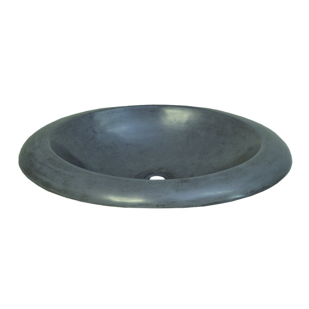 Gray-green concrete circular bathroom sink with wide rim and center drain hole.