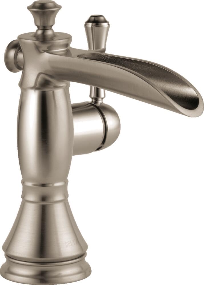 Brushed nickel single-handle bathroom faucet with curved spout, decorative handles, and metal pop-up drain.