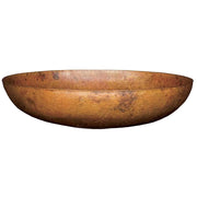 Hammered copper vessel sink with oval bowl shape and textured surface finish.