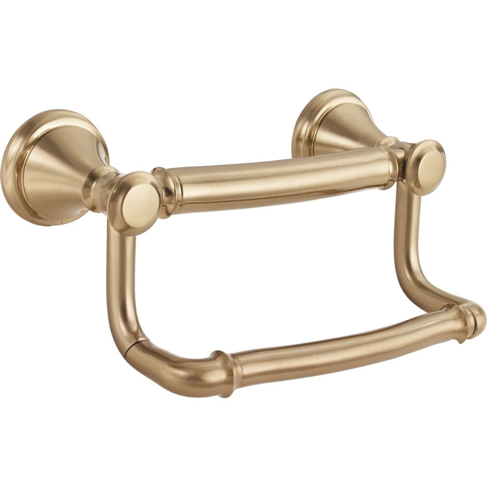 Brushed gold toilet paper holder with dual wall mounts and curved assist bar below.