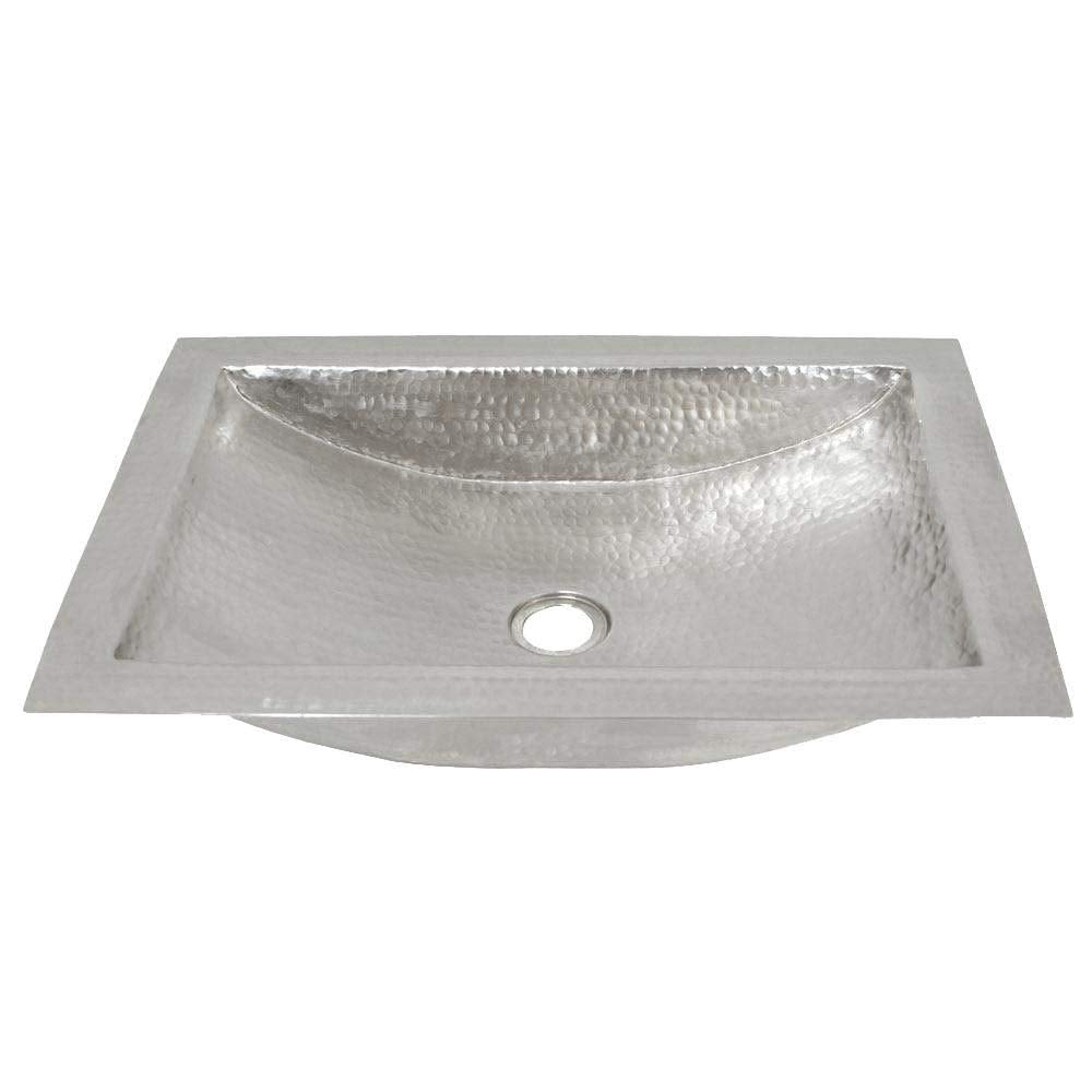 Rectangular hammered copper bathroom sink with curved basin and single drain hole.