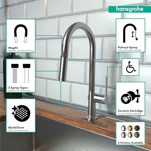 Hansgrohe Talis N steel optic high arc kitchen faucet with pull-down spray head mounted on subway tile backsplash.