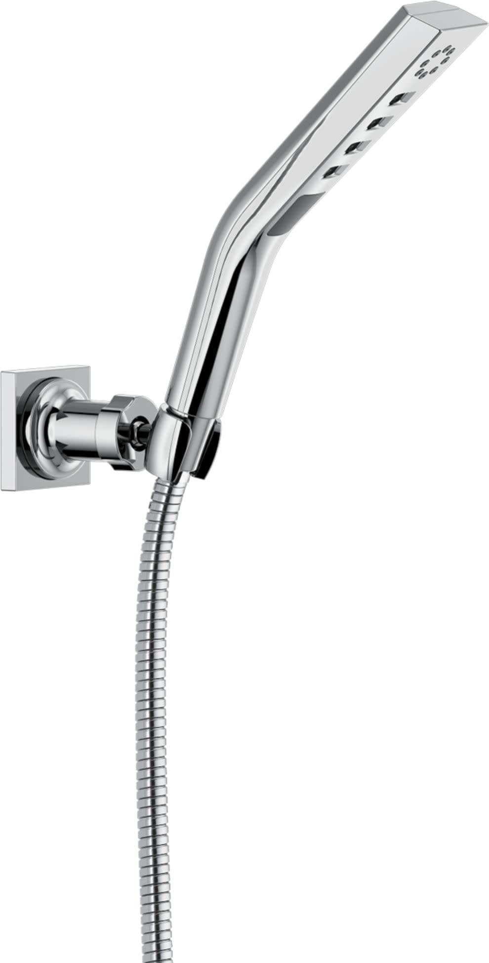 Chrome hand shower with angled head and multiple spray jets mounted on wall bracket with flexible hose.
