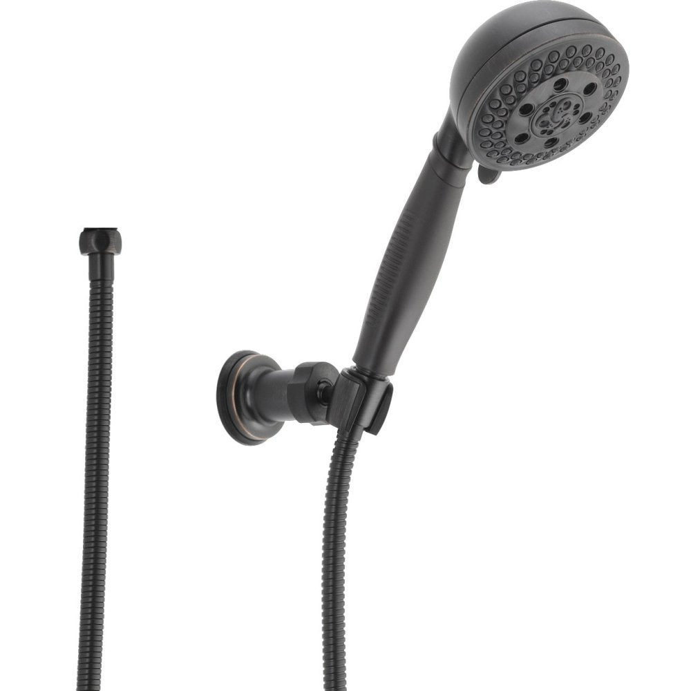Matte black hand shower with adjustable spray head mounted on wall bracket with flexible hose.