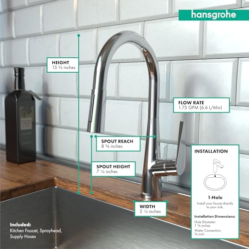 Chrome high-arc kitchen faucet with pull-down sprayer on white subway tile backsplash and wood countertop.
