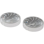 Two clear Delta buttons with red and blue indicator dots and curved decorative ridges on white bases.