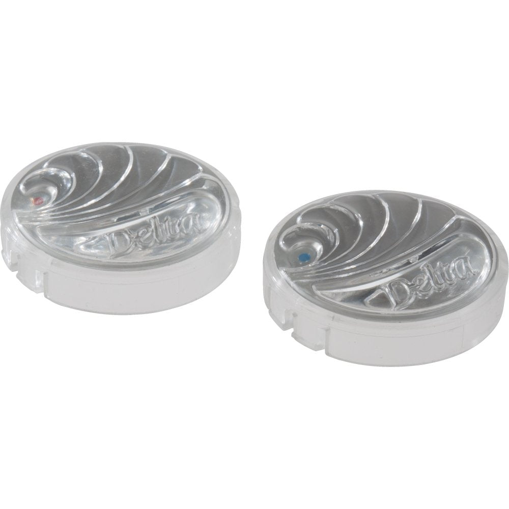 Two clear Delta buttons with red and blue indicator dots and curved decorative ridges on white bases.