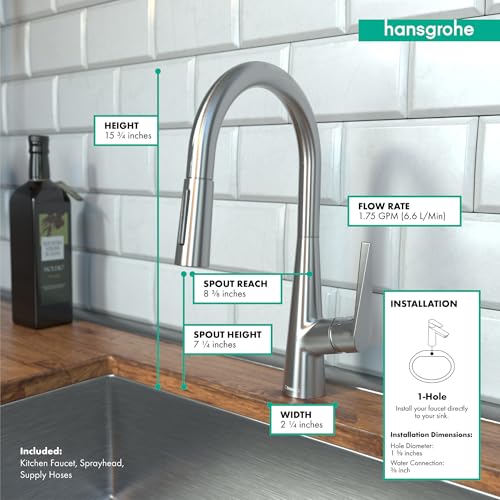 Steel optic high-arc kitchen faucet with pull-down sprayer head, mounted on countertop with white subway tile backsplash.