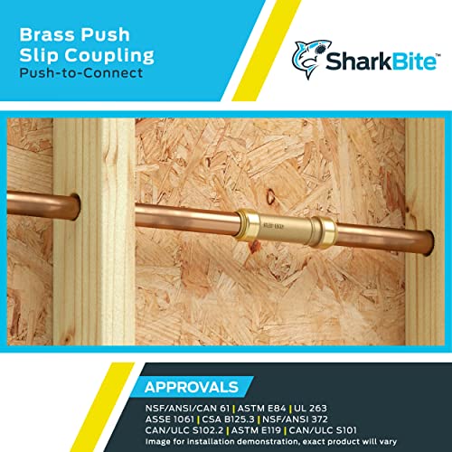 Brass push-to-connect slip coupling fitting with two copper pipes inserted through the center fitting.