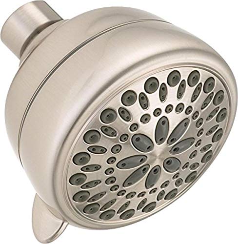 Brushed nickel shower head with multiple spray holes and cylindrical connector on white background.