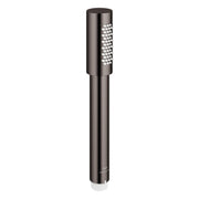 Hard graphite cylindrical hand shower with multiple spray jets arranged on one side of the head.