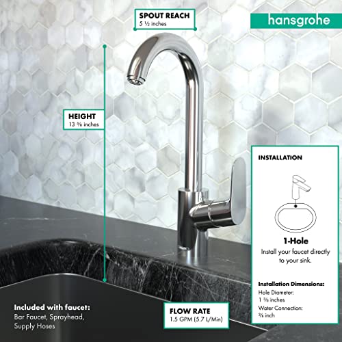 Chrome single-handle bar faucet with curved spout, 13¾ inches height, 5½ inches spout reach, mounted on black countertop with