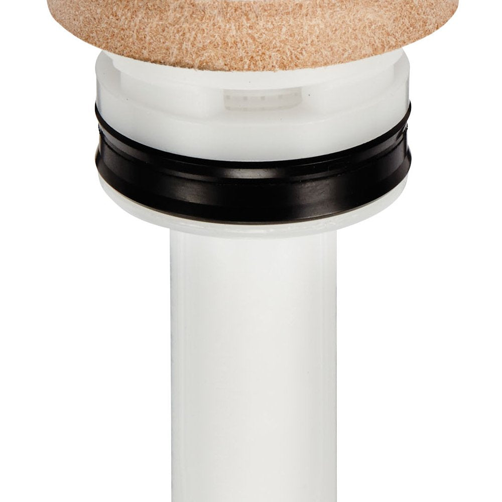 White piston assembly with black rubber seal ring and cork top cap for Grohe faucet repair.