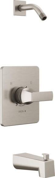 Stainless steel Delta tub and shower valve with single lever handle, shower arm, and spout.
