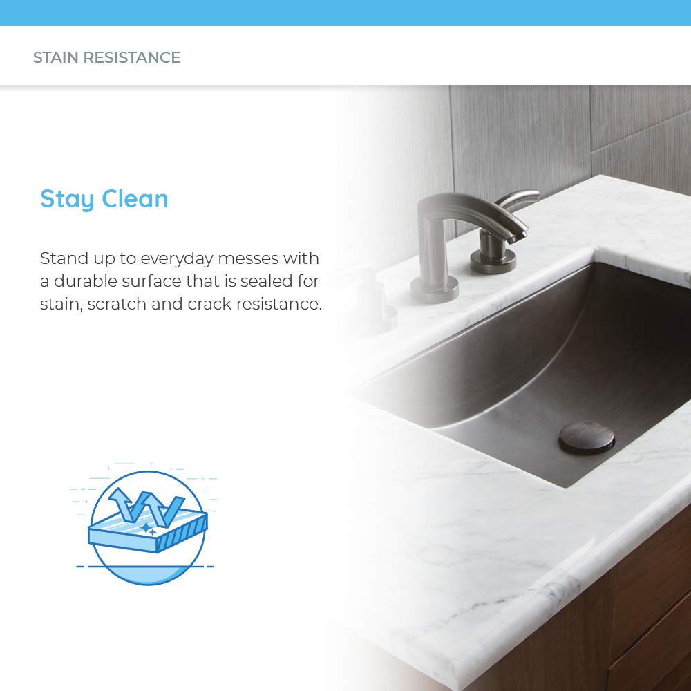 Ash-colored bathroom sink with curved basin, white marble countertop, and dual faucet holes with brushed metal fixtures.