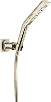 Brushed nickel wall-mount hand shower with curved handle, multiple spray jets, and flexible hose connection.