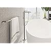 Brushed nickel soap dish mounted on bathroom wall next to white sink.