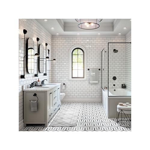 Matte black widespread bathroom faucet with dual handles and pop-up drain installed on sink vanity.